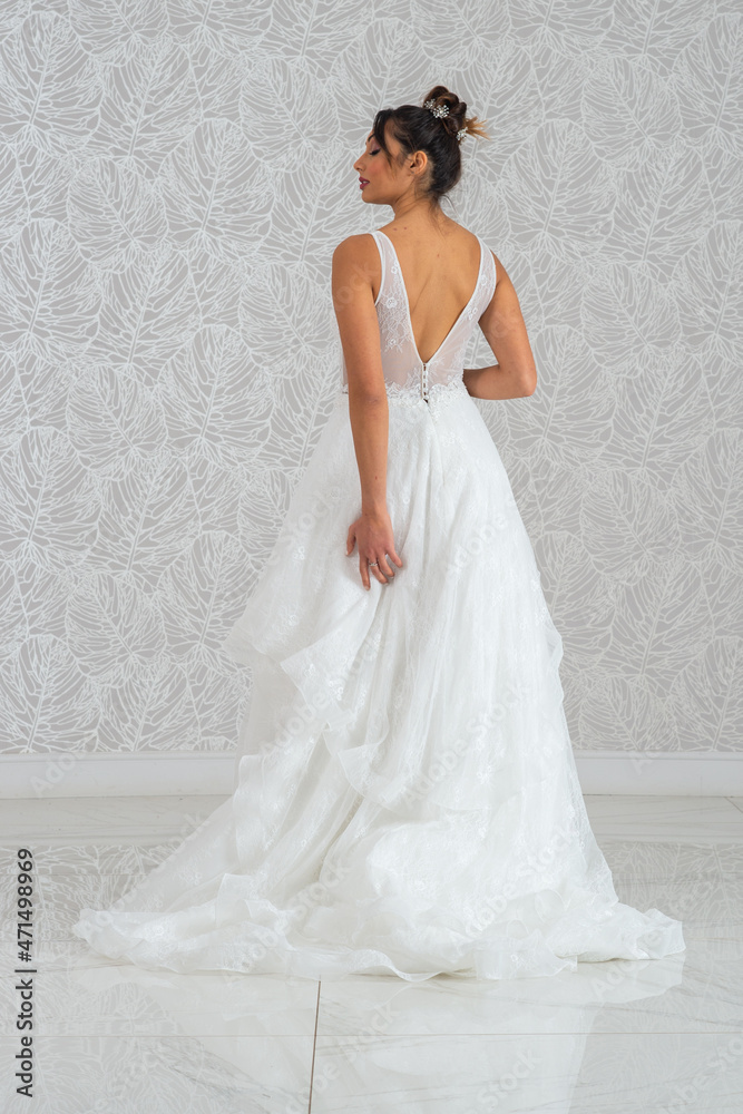 Girl with wedding dress posing for photo shoot Girl with wedding dress posing for photo shoot