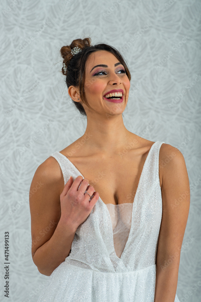 Girl with wedding dress posing for photo shoot Girl with wedding dress posing for photo shoot