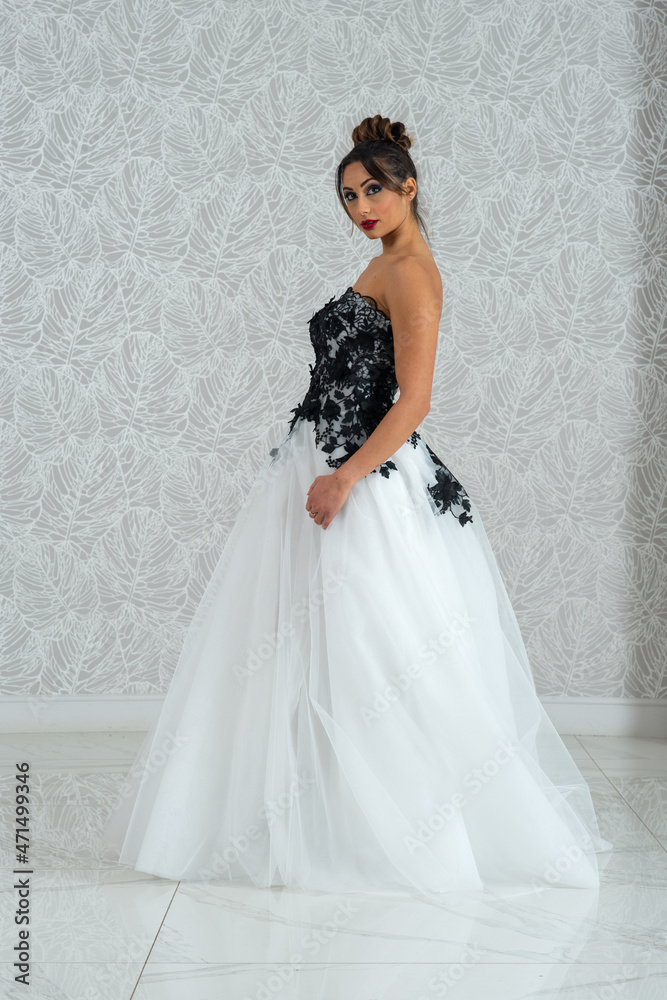 Girl with wedding dress posing for photo shoot Girl with wedding dress posing for photo shoot