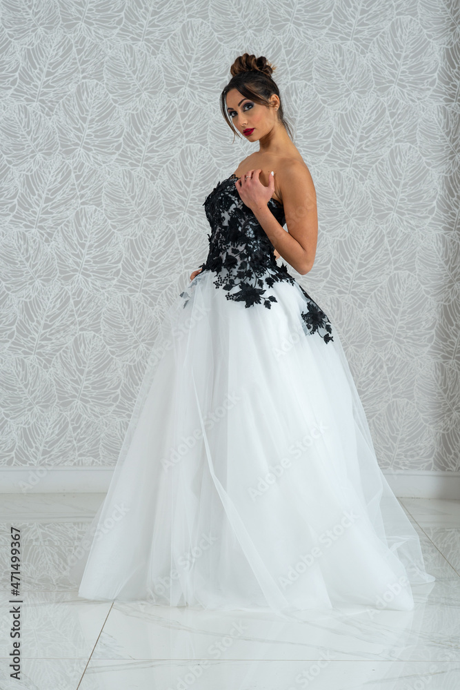 Girl with wedding dress posing for photo shoot Girl with wedding dress posing for photo shoot
