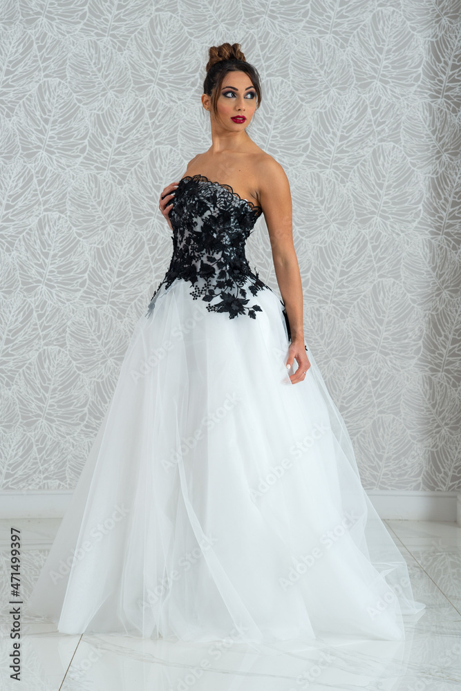 Girl with wedding dress posing for photo shoot Girl with wedding dress posing for photo shoot