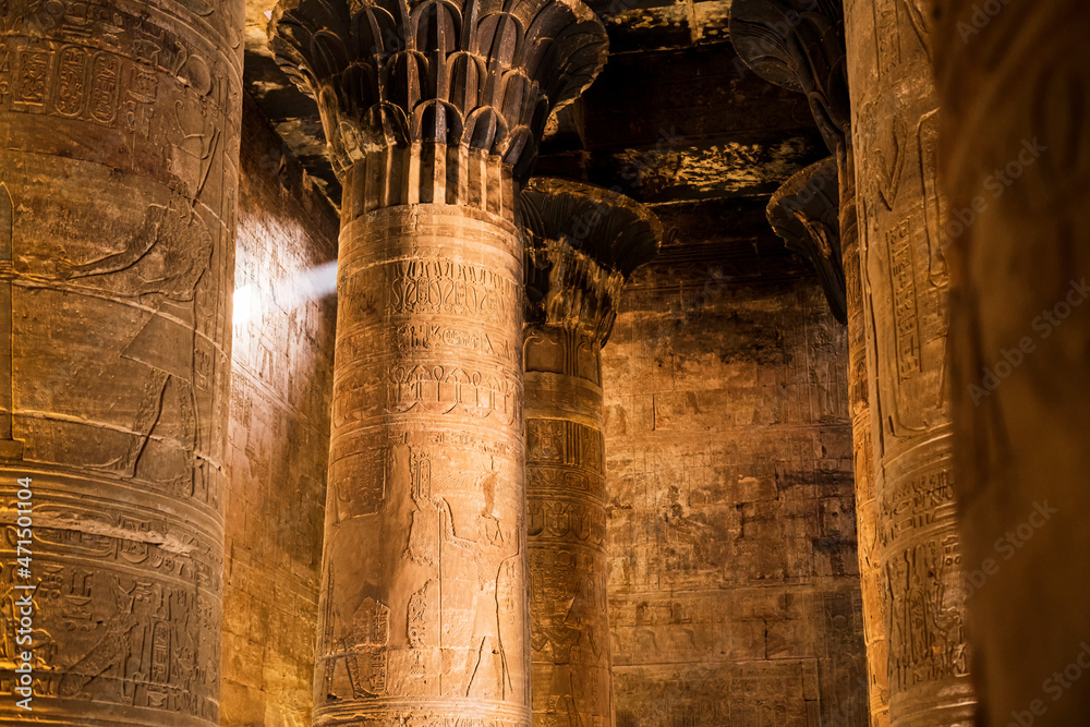 Interior room of the Temple of Edfu with huge columns decorated with hieroglyphics. Photograph taken in Edfu, Aswan, Egypt. - obrazy, fototapety, plakaty 