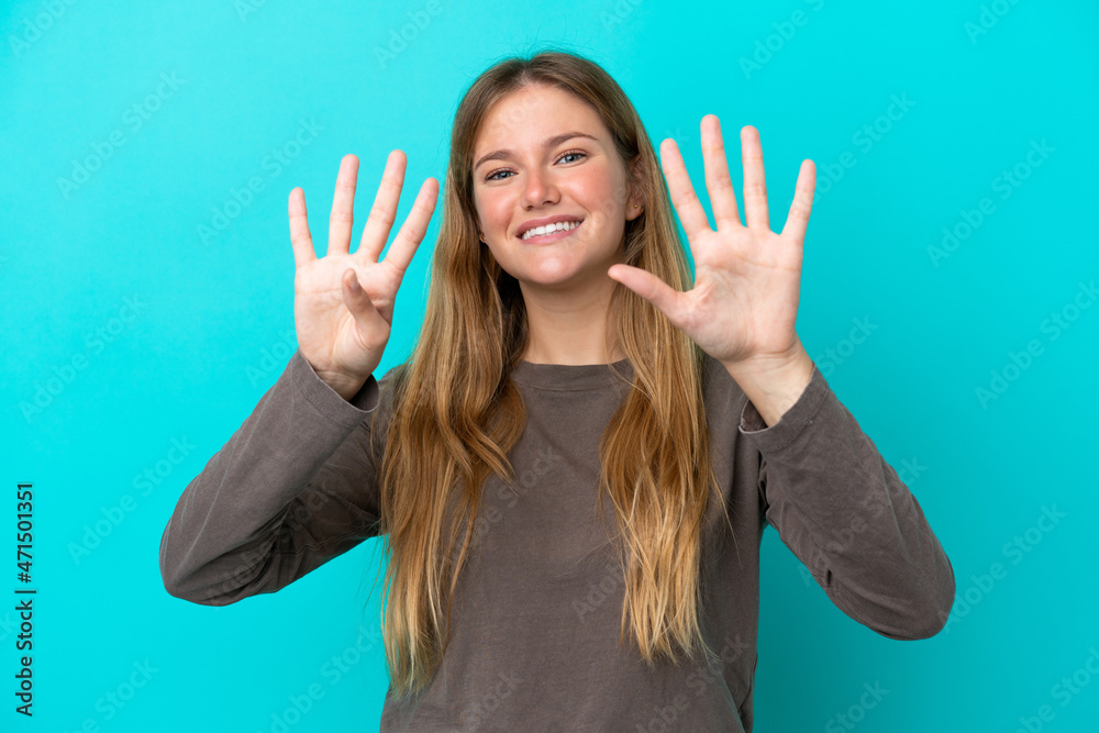 Young blonde woman isolated on blue background counting nine with fingers Young blonde woman isolated on blue background counting nine with fingers