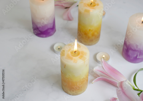 candle burning  flower lily background