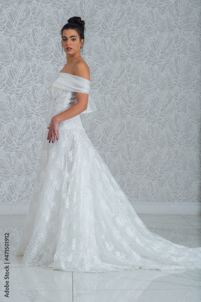 Girl with wedding dress posing for photo shoot Girl with wedding dress posing for photo shoot