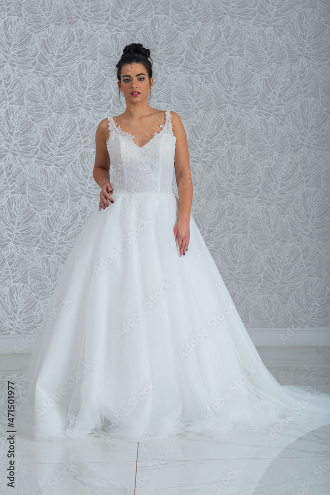 Girl with wedding dress posing for photo shoot