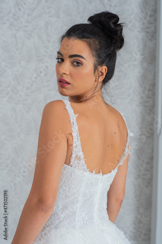 Girl with wedding dress posing for photo shoot