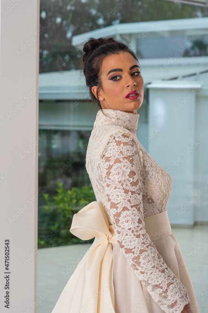 Girl with wedding dress posing for photo shoot Girl with wedding dress posing for photo shoot