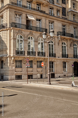 Sunny Paris street with ottoman buildings 