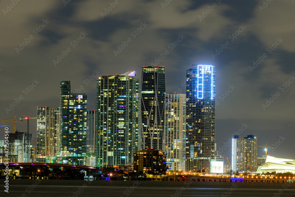 Miami business district, lights and reflections of the city lights. Miami night downtown.