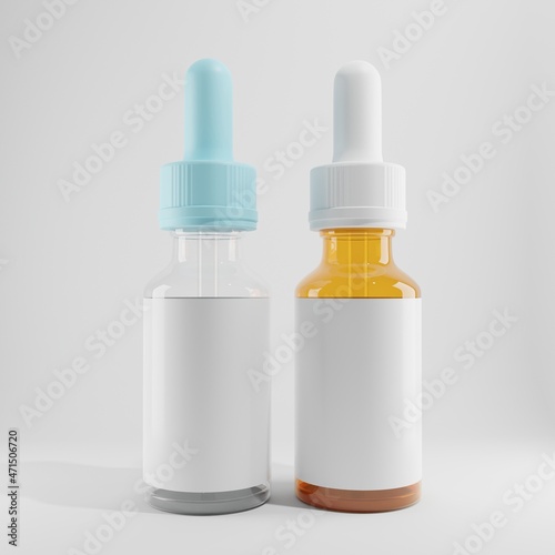 two glass droppers bottle different color with blank label  on white background 