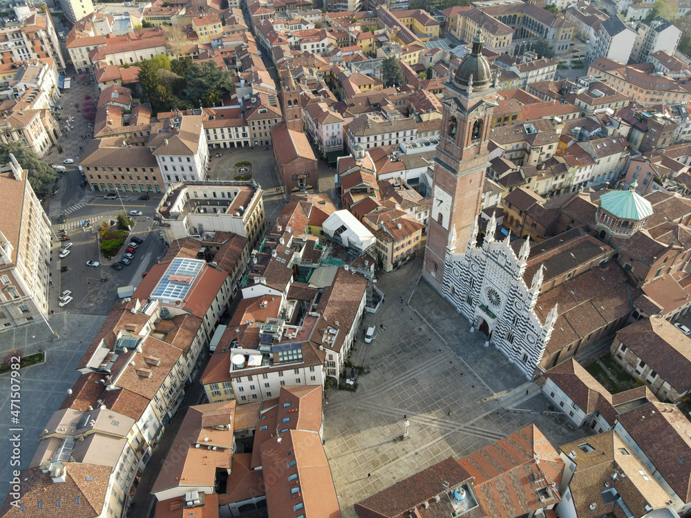 Fototapeta premium Aerial view of facade of the ancient Duomo in Monza (Monza Cathedral). Drone photography of the main square with church in Monza in north Italy, Brianza, Lombardia, near Milan.