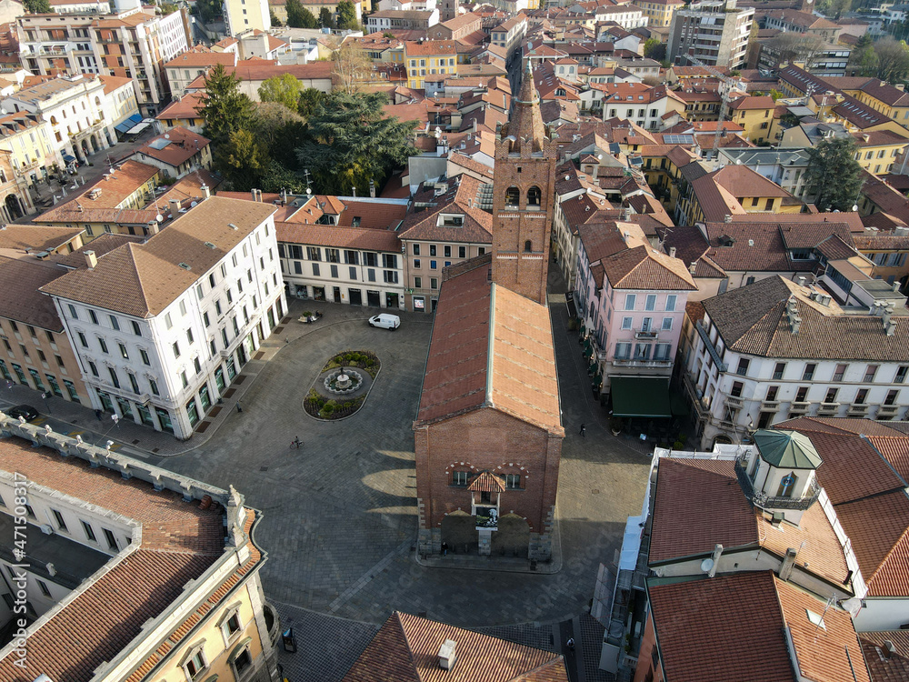 Fototapeta premium Aerial view of facade of the ancient Duomo in Monza (Monza Cathedral). Drone photography of the main square with church in Monza in north Italy, Brianza, Lombardia, near Milan.