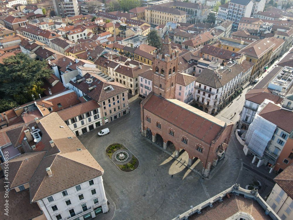 Fototapeta premium Aerial view of facade of the ancient Duomo in Monza (Monza Cathedral). Drone photography of the main square with church in Monza in north Italy, Brianza, Lombardia, near Milan.