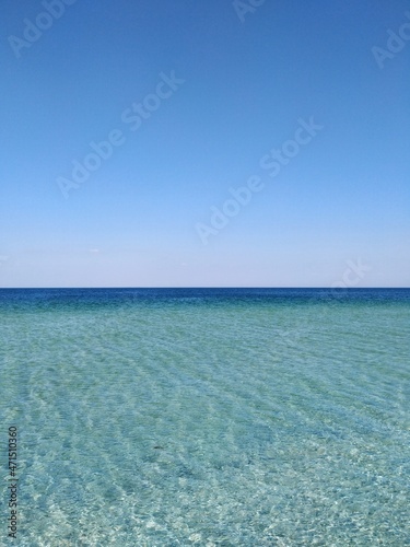 Ripples on the crystal clear turquoise and blue water of the Black sea in Ukraine