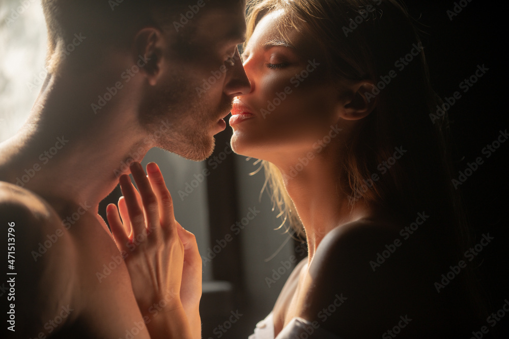 Portrait of lovely couple in love. Young sensual girlfriend glad to