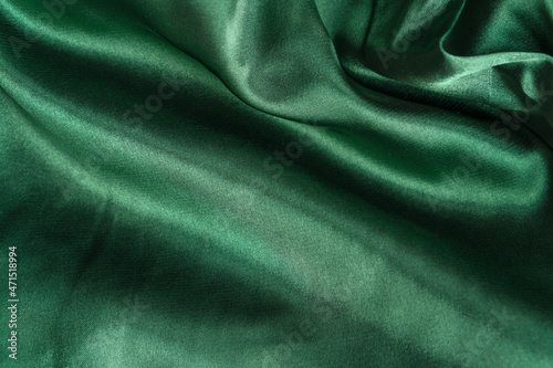 Wallpaper Mural Elegant smooth green silk or satin folds closeup. Cloth texture background. Abstract wallpaper. Trendy mint green backdrop for web design. Luxury twisted fabric backplate  Torontodigital.ca