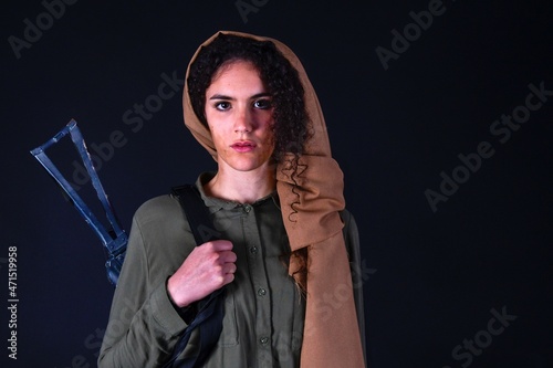 Portrait of a Kurdish guerilla girl.