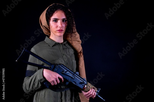 Portrait of a Kurdish guerilla girl.