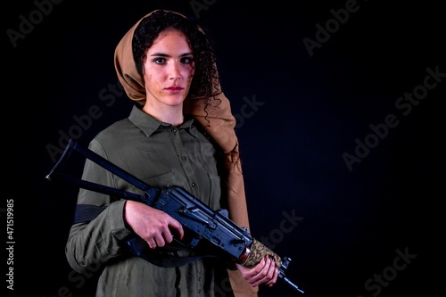 Slika na platnu Portrait of a Kurdish guerilla girl.