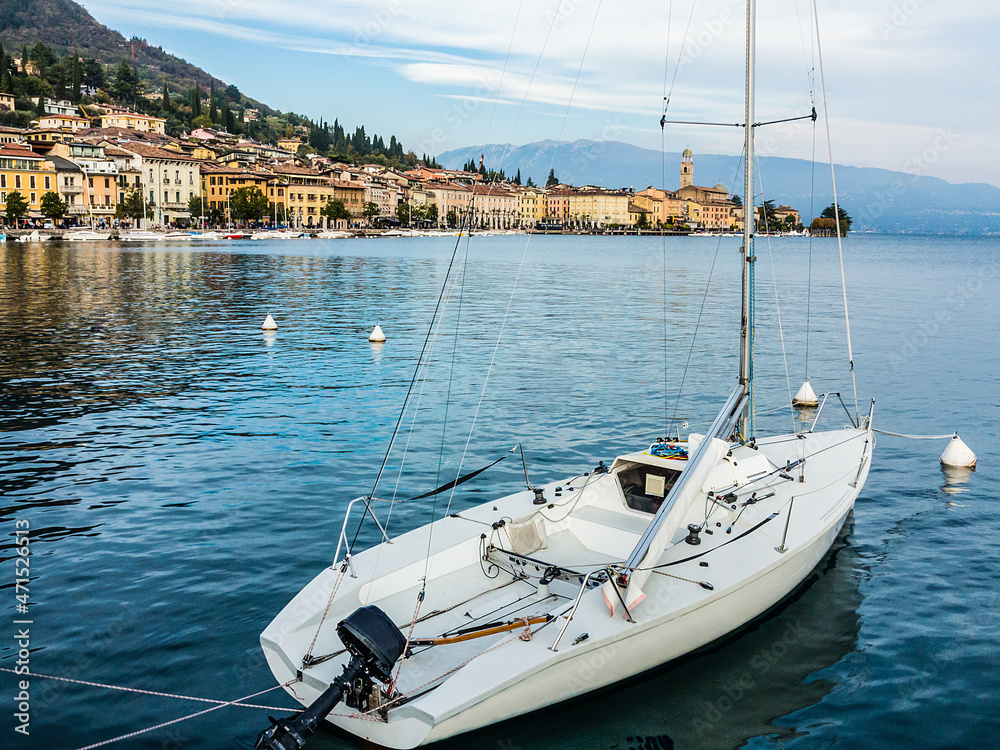 Sailboat with Salò in the background-Garda lake-Italy