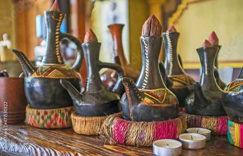 Ethiopian jebena coffee pots on the bar counter, Kyiv, Ukraine photo