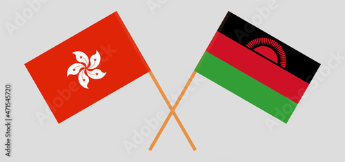 Crossed flags of Hong Kong and Malawi. Official colors. Correct proportion