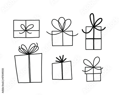 Vector set of doodle gift boxes with ribbon bow isolated on white background.