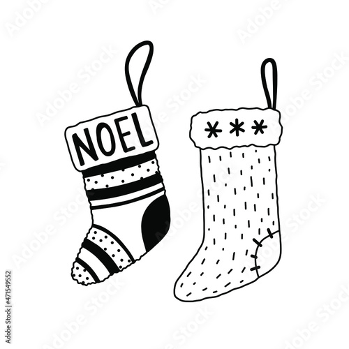 Vector pair of socks isolated on white. Hand drawn doodle Christmas stockings.