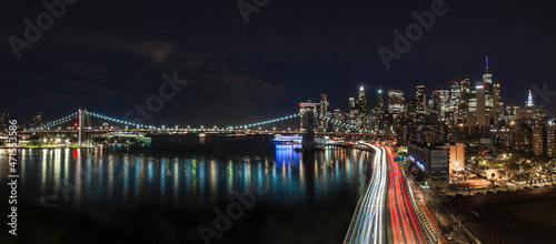 Panorama at twilight of Lower Manhattan and the Brooklyn Bridge seen from the Manhattan Bridge