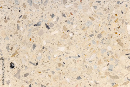 Terrazzo pattern marble-mosaic natural concrete floor. Trendy texture for flooring and facades.