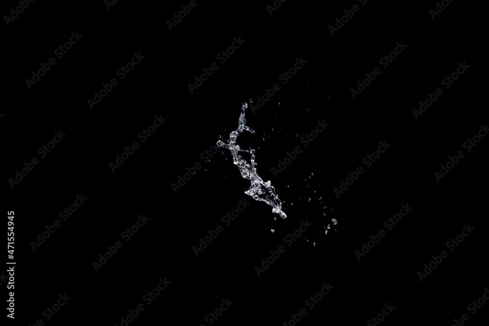 Water splash isolated on black background.
