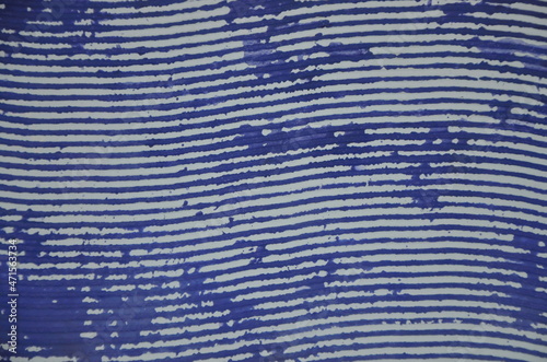blue blurred horizontal stripes on a light background. background for design. handmade from paint