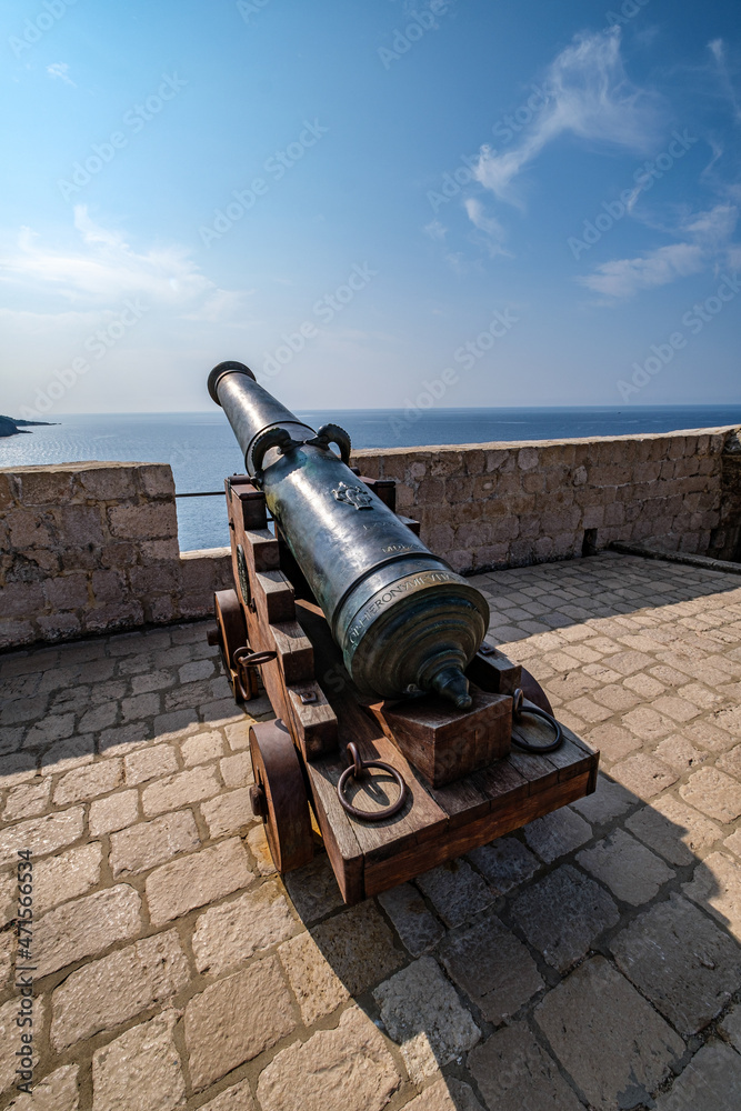 Old cannon in Dubrovnik. Vintage war weapon for defense and protection. Medieval fort in Dubrovnik protected by guns.