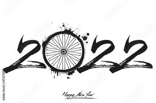 Numbers 2022 and a abstract bike wheel made of blots in grunge style. Design text logo Happy New Year 2022. Template for greeting card, banner, poster. Vector illustration on isolated background photo