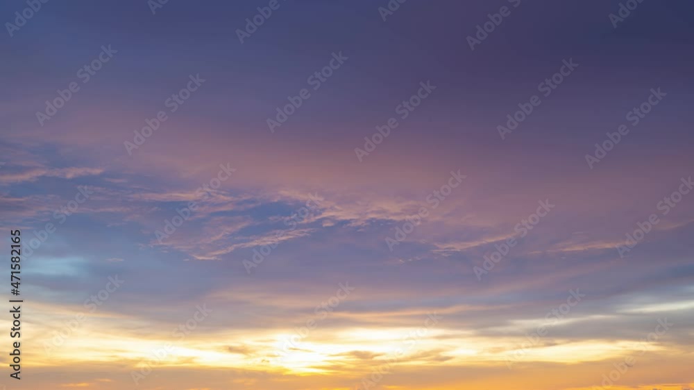 Time Lapse colorful dark clouds in sunset time Beautiful light of nature Amazing colors of the setting sun Majestic clouds flowing in sunset sky Evening dark clouds,day to night 4-K Time Lapse