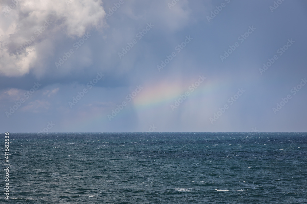 Rainbow seen from cliffs of Tyulenovo village on Black Sea shore, Bulgaria