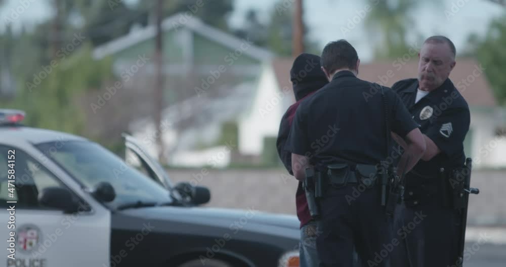 Police Officer Holsters Gun After Suspect Cuffed, Walks Over To The Perp At, LAPD Police Officer Holsters Gun After Suspect Cuffed, Walks Over To The Perp At, LAPD
