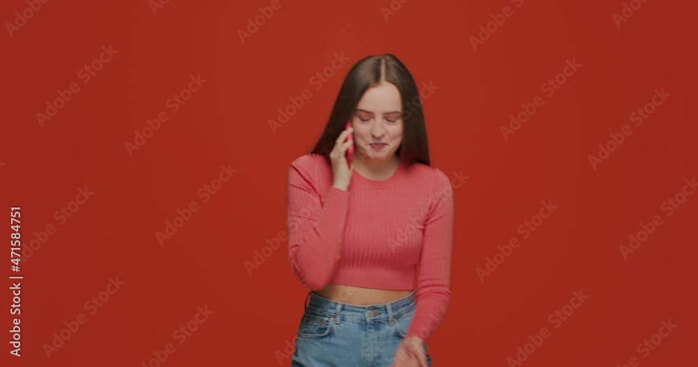 Smiling young girl making call talking on phone, happy woman enjoying mobile conversation, having fun, telling news Smiling young girl making call talking on phone, happy woman enjoying mobile conversation, having fun, telling news