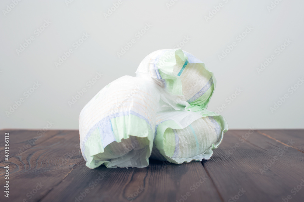 Diapers waste, dirty diapers. Disposing of used baby nappies