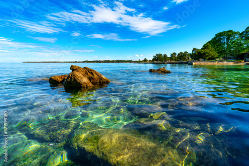 Splendid spring view of popular summer resort Porec. Colorful spring seascape of Adriatic Sea. Scenic view of Istrian Peninsula in western Croatia, Europe. Vacation concept background.