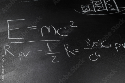 e=mc2 formula on blackboard, general theory of relativity formula, Einstein photo