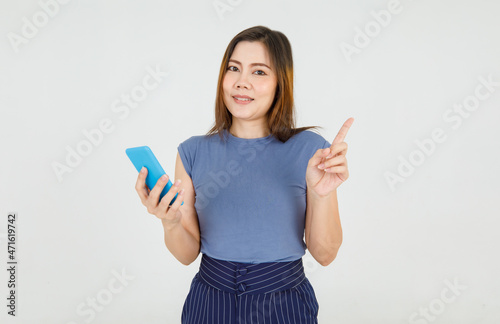Obraz na plátně Lovely young Asian woman happy and smile to inform significant notice and carefu