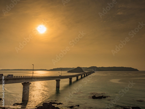                         Tsunoshima Bridge and the setting sun.
