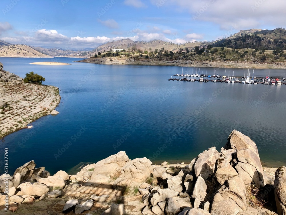 a millerton lake state park boat dock rests in the low water of the