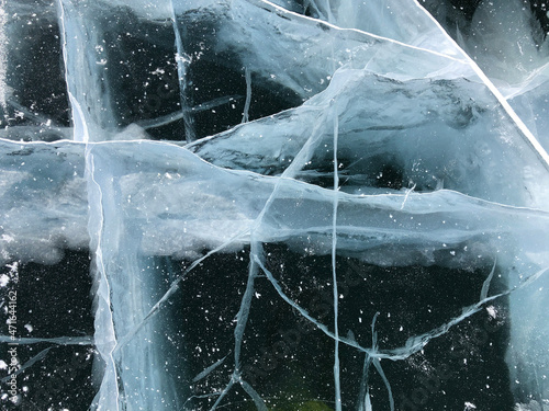 Lake Baikal ice texture. Cracks in the ice. Frozen Lake Baikal.