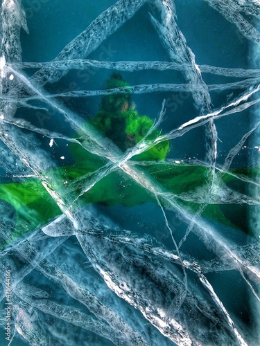 Lake Baikal ice texture. Cracks in the ice. Frozen Lake Baikal.