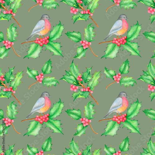 Watercolor seamless pattern with bird and holly isolated on green background.Good for fabrics,textile,wrapping paper and much more.