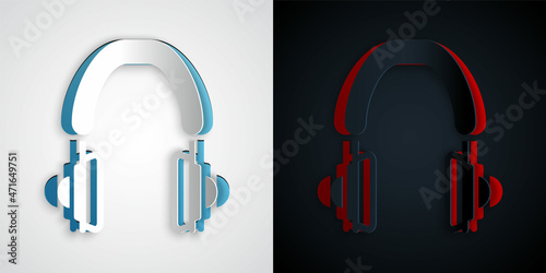Paper cut Headphones icon isolated on grey and black background. Earphones. Concept for listening to music, service, communication and operator. Paper art style. Vector