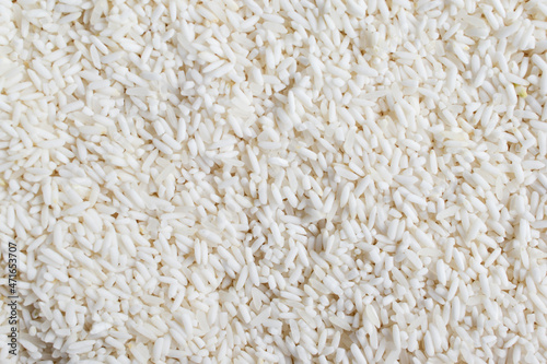 Beautiful clean white rice grain texture background close-up abstract